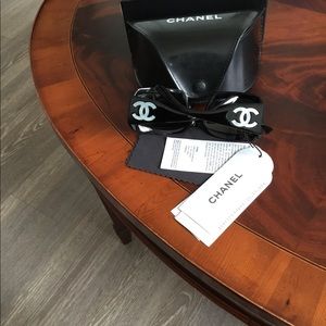 100% Authentic Chanel leather signature logo.